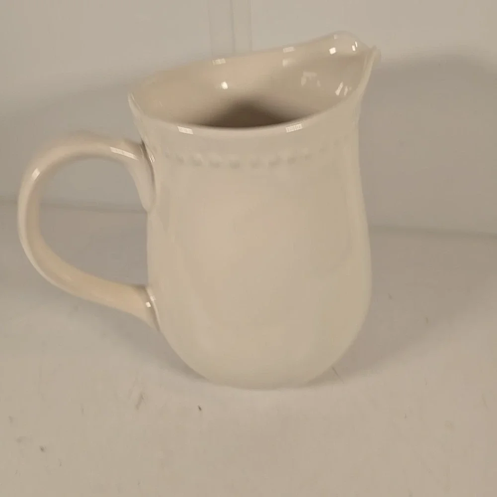 WHITE HOME CERAMIC PITCHER 7 1/2 INCHES‎ TALL